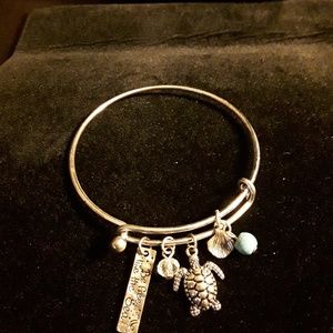 Silver bracelet with 5 charms